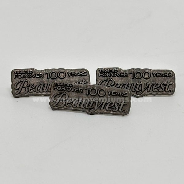 Premium quality embossed enamel lapel pins with custom logos, perfect for corporate events, awards, and promotional gifts. Available in bulk supply