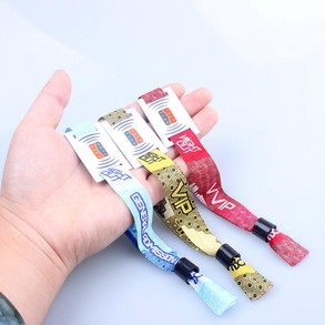 Woven wristband with QR code tag for secure event admission and access control