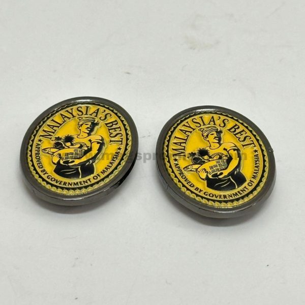 Branded enamel lapel pins with embossed metal finish, ideal for marketing campaigns, organization logos, and fashion accessories. Bulk printing in Malaysia