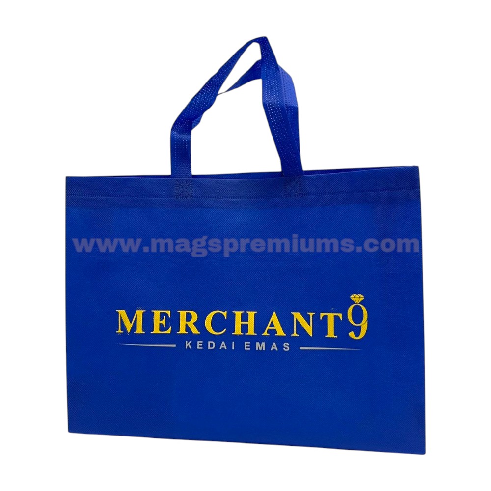 Royal blue reusable shopping carry bag with metallic gold logo printing, suitable for retail packaging, exhibitions, and promotional giveaways.