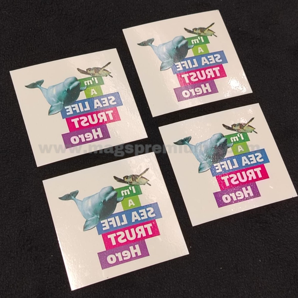 Custom temporary tattoo stickers with colorful sea life design featuring a whale, turtle, and motivational text, printed on glossy transfer paper for events, promotions, and children's activities.