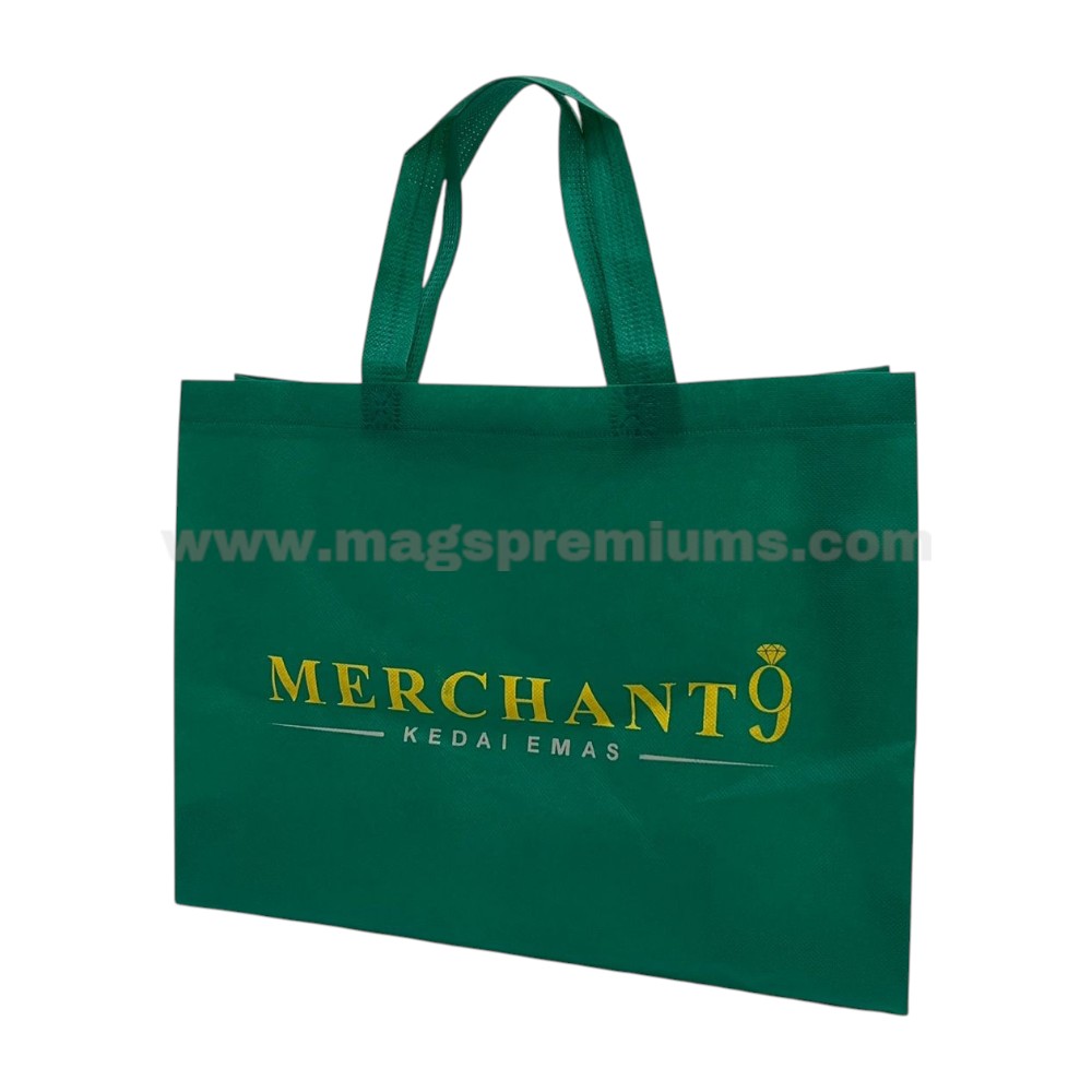 Black reusable tote bag with premium gold logo printing, designed for luxury retail packaging, shopping, and corporate branding campaigns.