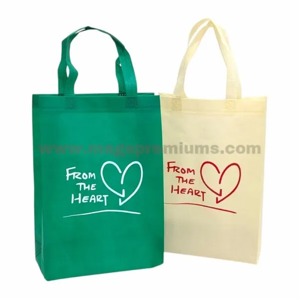 Green and cream non woven tote bags with printed heart logo design and carry handles, suitable for promotional giveaways, retail packaging, events, and eco-friendly shopping use.