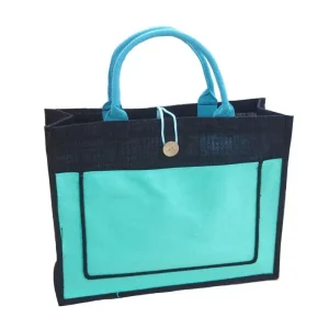 black laminated canvas bag with light blue front pocket and matching handles