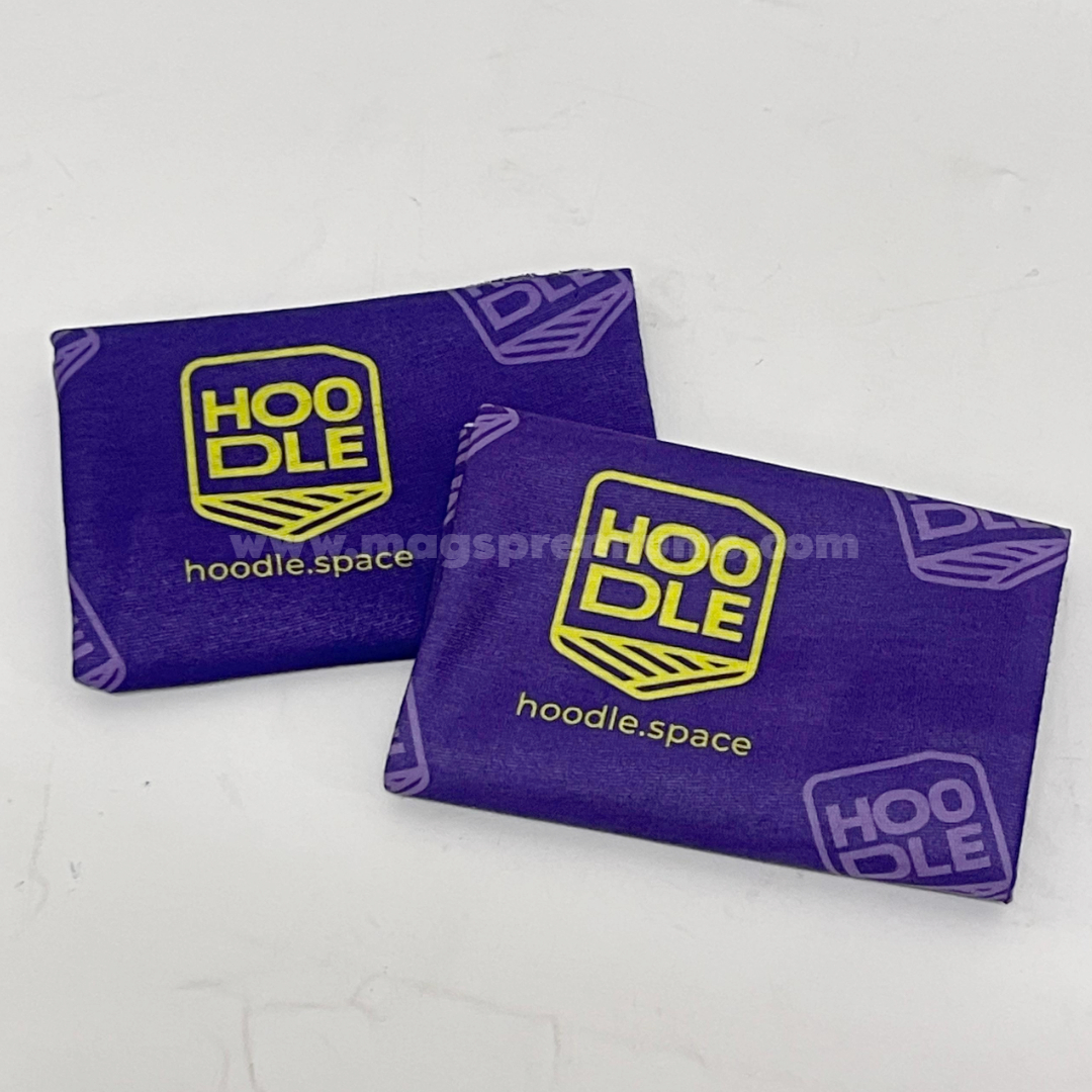 Two folded purple custom bandanas featuring HOOQLE logo and branded pattern design.