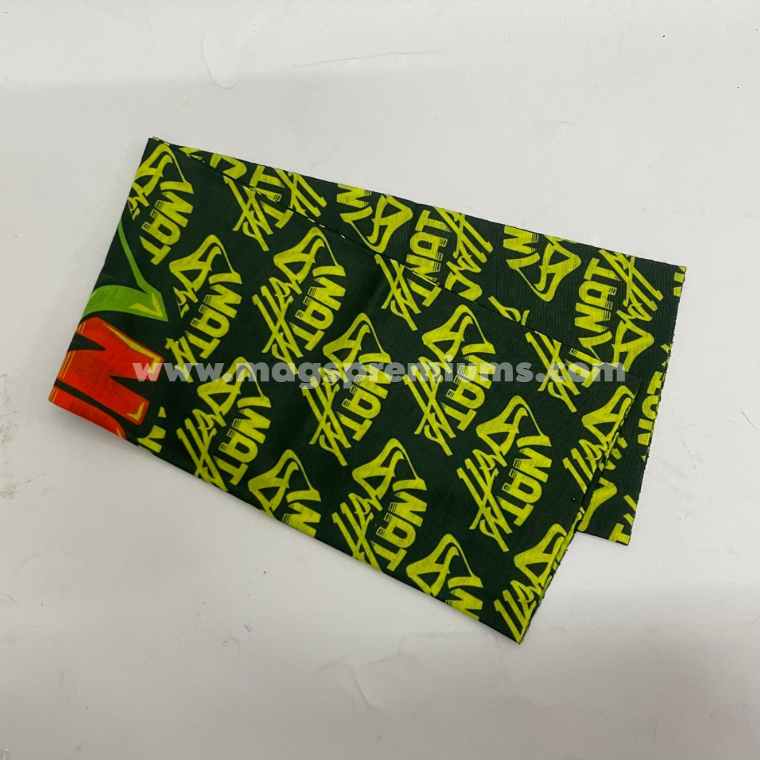 Custom green bandana with repeating yellow graphic pattern and full-colour sublimation printing.