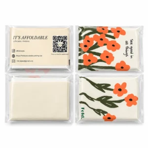 Custom printed pocket tissue packs in clear wrap with floral designs, QR code and logo printing