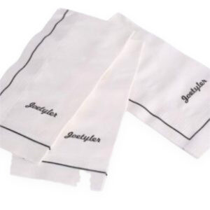 White custom printed napkins with a dark logo