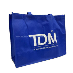 Blue non-woven tote bag printed with TDM branding