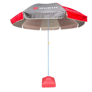 Red and white printed parasol umbrella with pole and base