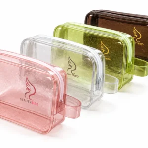 Custom transparent PVC zipper pouches with glitter in pink, clear, green and brown with printed BEAUTYBIRD logo