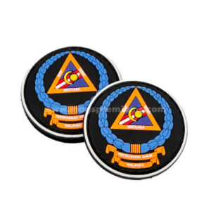 Embroidered circular patches with blue and orange designs
